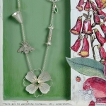 The more one gardens…Mantel box containing a garden-inspired silver necklace -   -  Eclectic Artisans